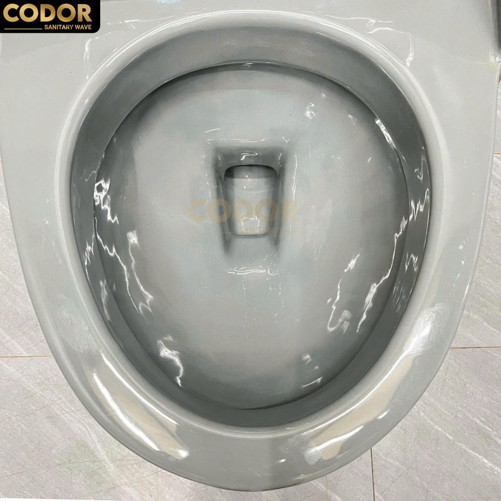 bồn cầu trứng xám viền vàng
